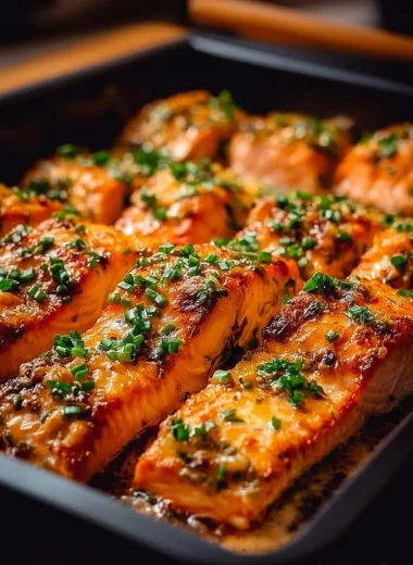 Delicious Bang Bang Salmon dish garnished with fresh herbs and spices