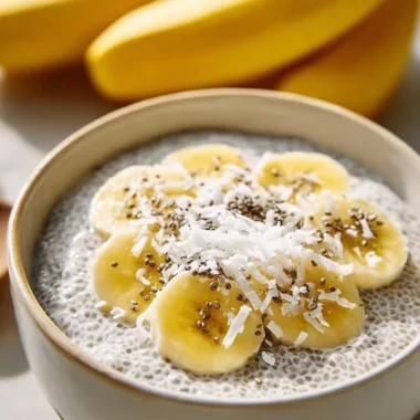 Healthy Cinnamon Banana Chia Seed Pudding in a glass bowl with banana slices on top