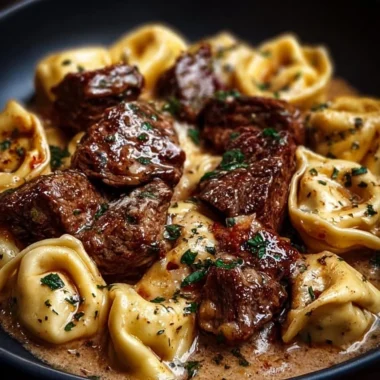 Garlic Steak Tortellini dish with tender steak and pasta in garlic sauce