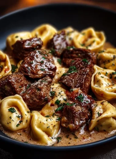 Garlic Steak Tortellini dish with tender steak and pasta in garlic sauce