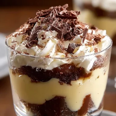 Delicious Irish coffee trifle layered with coffee-soaked cake and creamy topping.