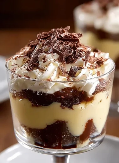 Delicious Irish coffee trifle layered with coffee-soaked cake and creamy topping.