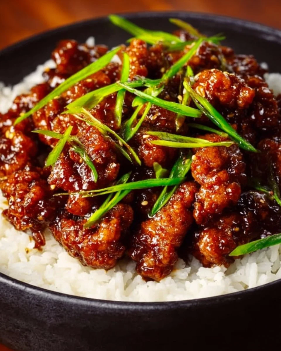 Spicy Dragon Chicken dish garnished with fresh herbs