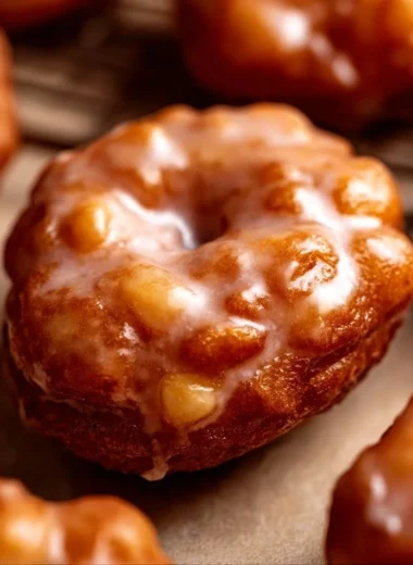Delicious baked apple fritters topped with a sweet glaze