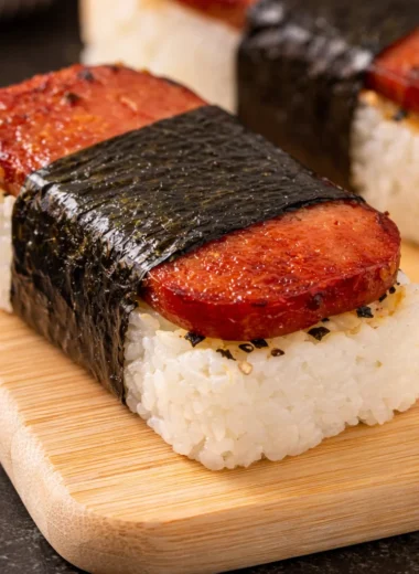 Spam musubi featuring sushi rice and marinated Spam wrapped in nori seaweed.