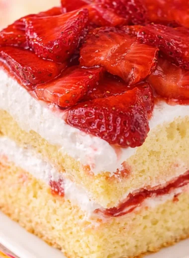 Delicious homemade strawberry shortcake with whipped cream and fresh strawberries.