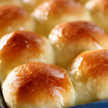 Soft and fluffy homemade dinner rolls served in a basket