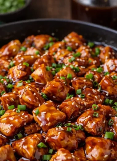 Delicious Bourbon Chicken dish served with rice and vegetables