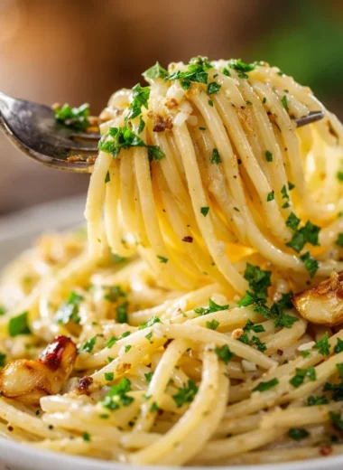 Creamy Garlic Pasta served on a plate, garnished with herbs and ready in 20 minutes.