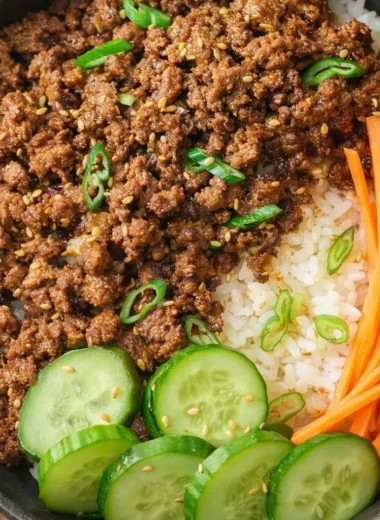 Korean beef bulgogi rice bowl with marinated beef, rice, and vegetables
