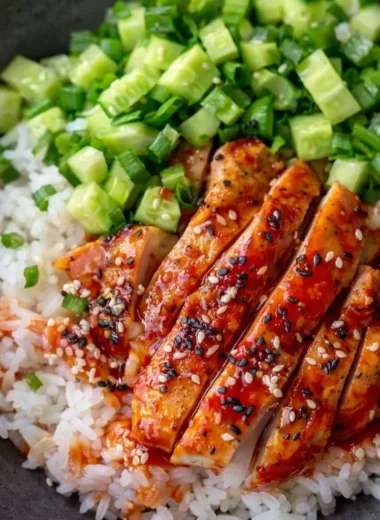 Delicious Korean Gochujang Chicken Rice Bowl with vegetables and sauce