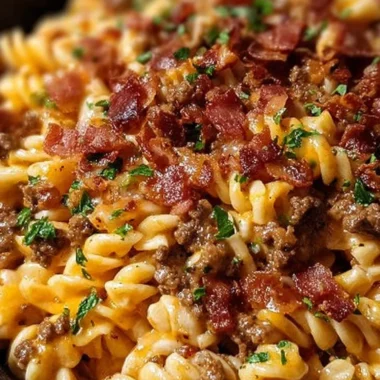 Delicious Loaded Bacon Cheeseburger Pasta topped with crispy bacon and cheese