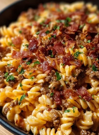 Delicious Loaded Bacon Cheeseburger Pasta topped with crispy bacon and cheese