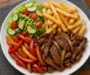 Sizzling Steak and Peppers with Fries and Salad