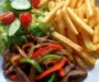 Crispy Pepper Steak Stir-Fry With Fries And Salad