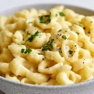 Delicious creamy German Spaetzle dish topped with herbs.