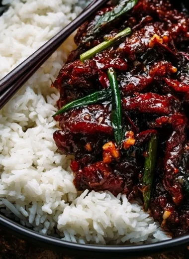 Crispy Mongolian Beef dish served with vegetables and rice