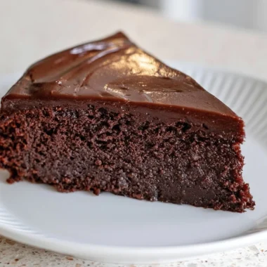 Decadent French Chocolate Cake with rich chocolate frosting and elegant presentation.
