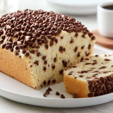 Decadent Ottilienkuchen chocolate sprinkle cake topped with colorful sprinkles