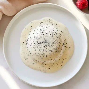 Golden Dampfnudel steamed dumplings on a plate, fluffy and delicious.