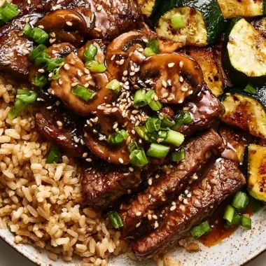 Delicious Hibachi Steak grilled to perfection with vegetables and sauces