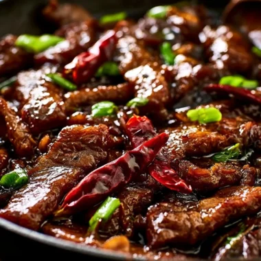 Delicious Mongolian Beef served with vegetables in a bowl.