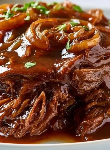 Tender slow cooker pot roast served with vegetables and gravy