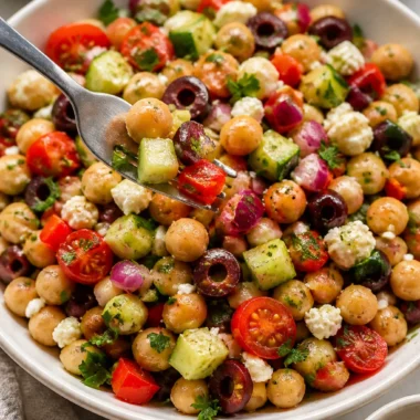 Cozy Mediterranean Chickpea Salad with fresh vegetables and herbs